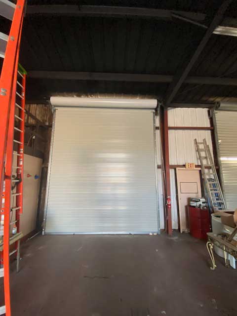 Plumber workshop garage door installation foley al