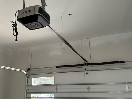 What are the signs your garage door opener needs repair or replacement